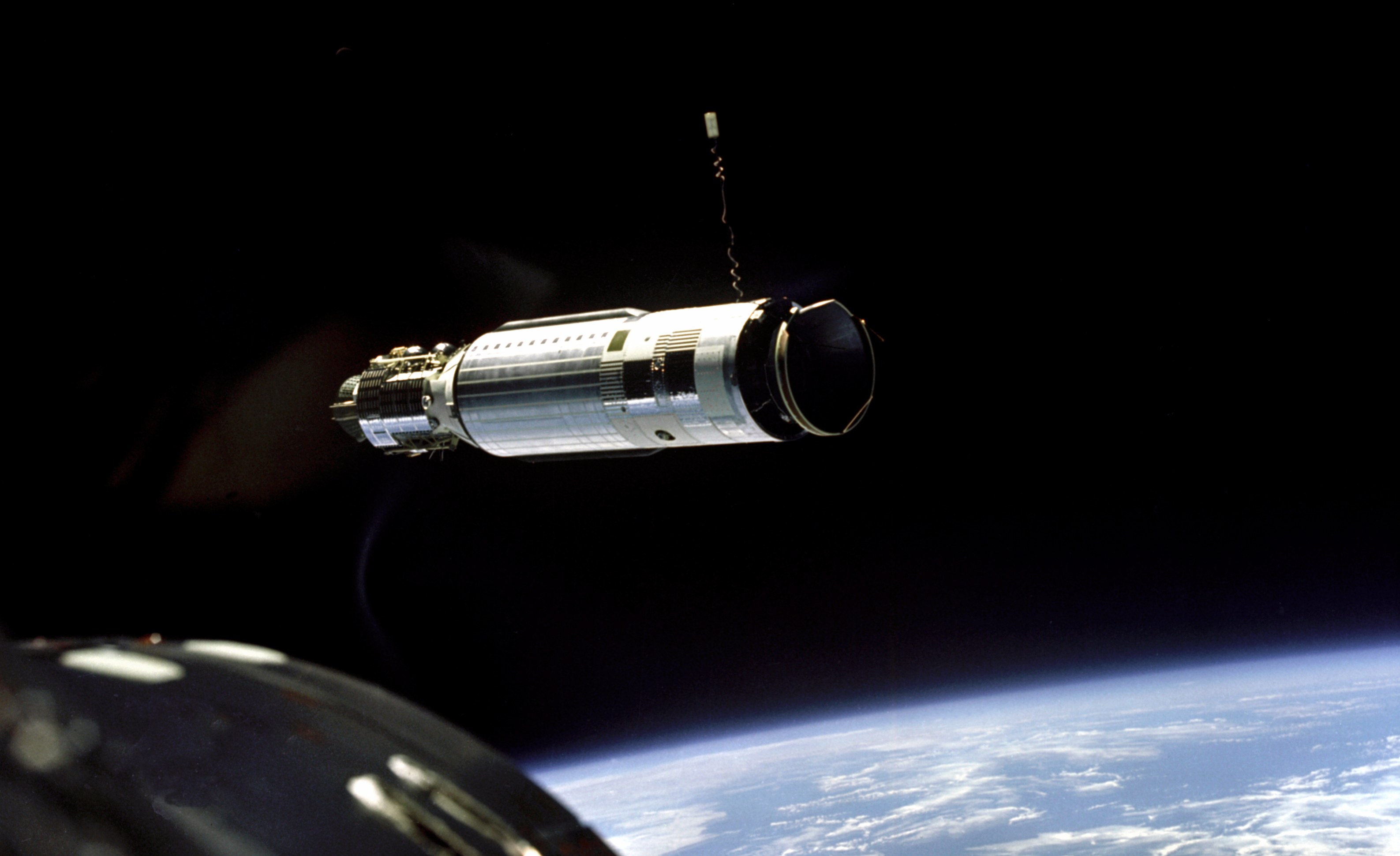 The Agena target vehicle photographed from Gemini VIII during the first docking of two spacecraft in orbit, 16 March 1966